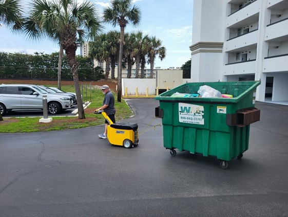 Waste caddy mover dumpster